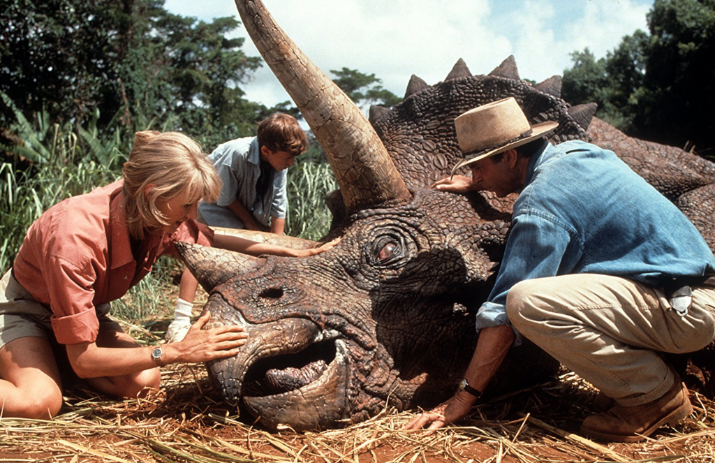 Jurassic Park (1993) Jurassic Park (1993) Laura Dern and Sam Neill tend to an injured triceratops